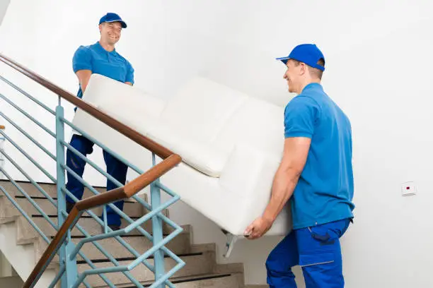 2 of our workers are helping our clients for Flat Removals London service.