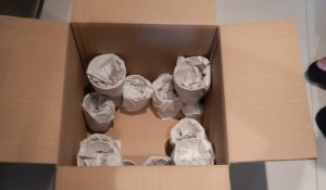 moving box filled with kitchenware for best way to pack glasses for moving